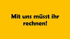 Schwarzer Schriftzug auf gelbem Grund: Mit uns müsst ihr rechnen